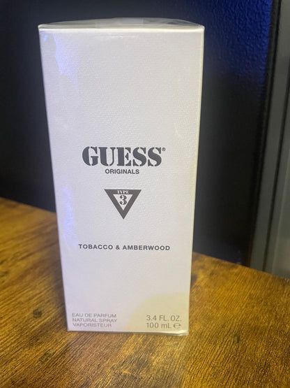 Discover New in Sealed Box Tobacco and Amberwood by Guess 100ml/3.4oz for men and women (FOS1319) - Premium Quality Fragrances | Best Seller,Designer,Fall,Fragrance,Guess,Seasonal,Unisex,Winter,Woody & Earthy by Feelings of Scent