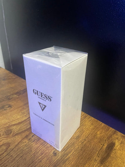 Discover New in Sealed Box Tobacco and Amberwood by Guess 100ml/3.4oz for men and women (FOS1319) - Premium Quality Fragrances | Best Seller,Designer,Fall,Fragrance,Guess,Seasonal,Unisex,Winter,Woody & Earthy by Feelings of Scent